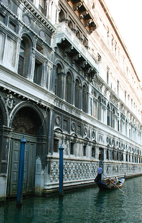 Channel to bridge of sights in venice photo